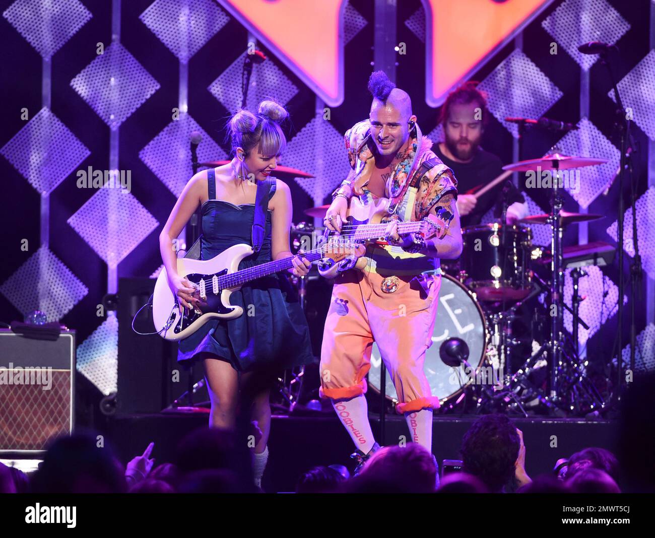 JinJoo Lee and Cole Whittle of DNCE perform at Z100's iHeartRadio