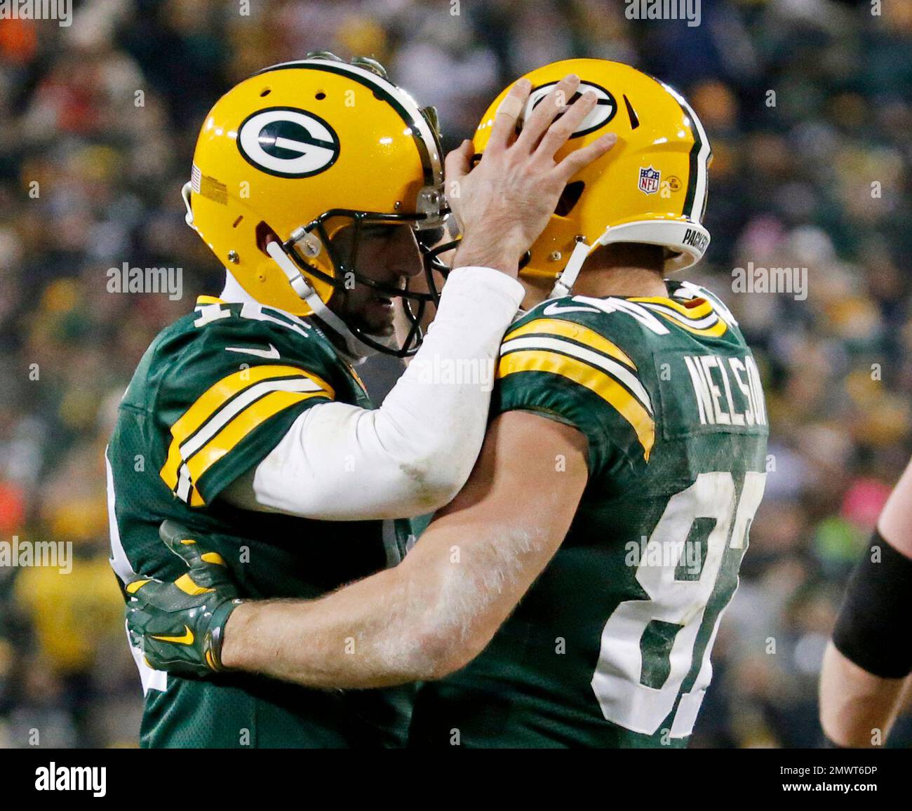FILE - In this Dec. 11, 2016, file photo, Green Bay Packers' Aaron Rodgers  congratulates Jordy Nelson after a touchdown catch during the second half  of an NFL football game against the