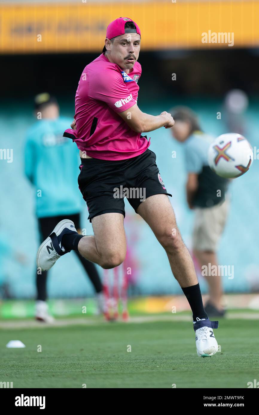 Ben Dwarshuis of Sydney Sixers warmup prior to the match between the