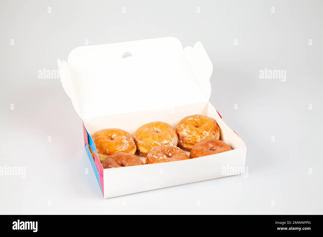 Glazed donuts in box unbranded packaging template mock up Stock Photo