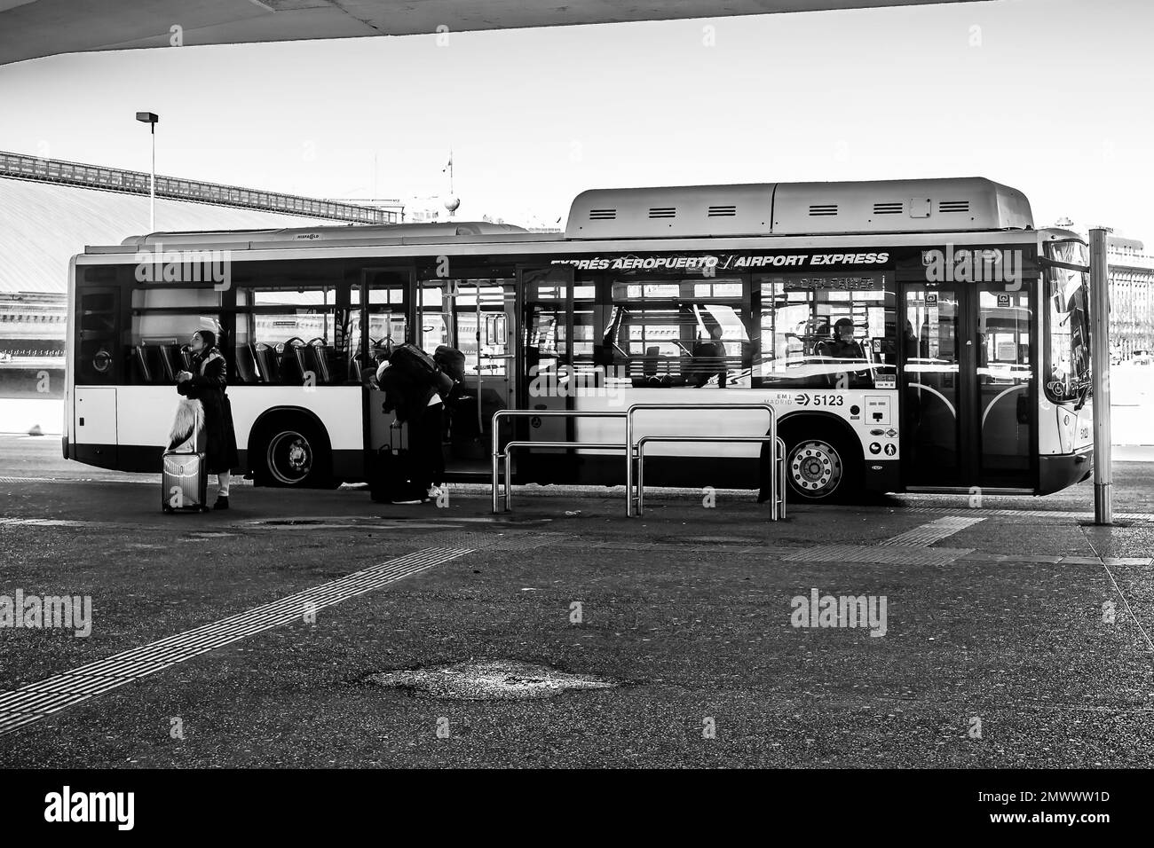 An airport bus outside Atocha railway station that has just arrived at the end of the journey from the airport. Stock Photo
