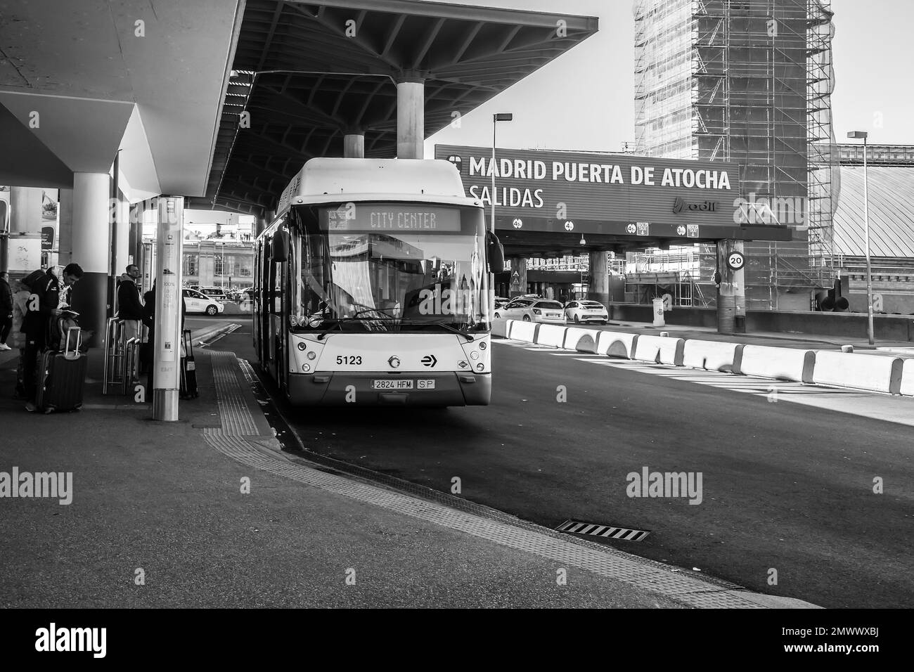 An airport bus outside Atocha railway station that has just arrived at the end of the journey from the airport. Stock Photo