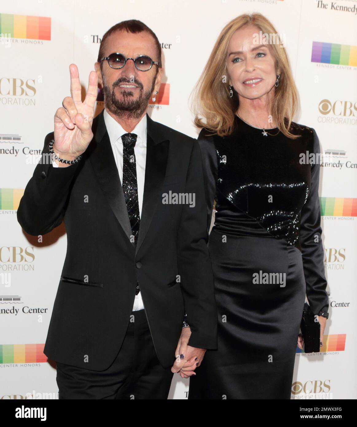 Ringo Starr of The Beatles, left, and his wife Barbara Bach attend the