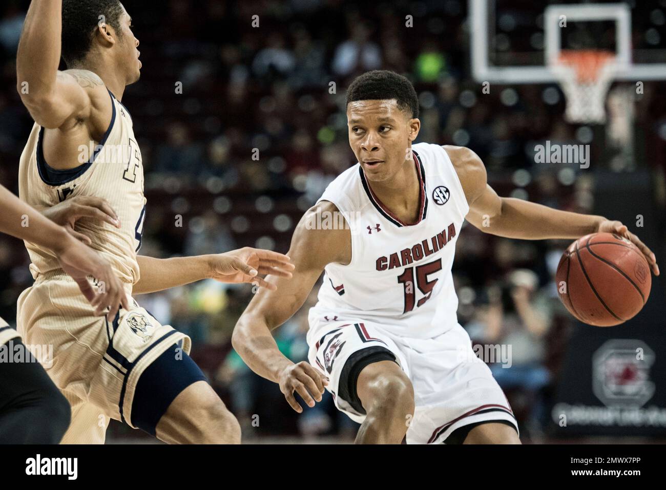 South Carolina guard PJ Dozier (15) dribbles the ball against Florida