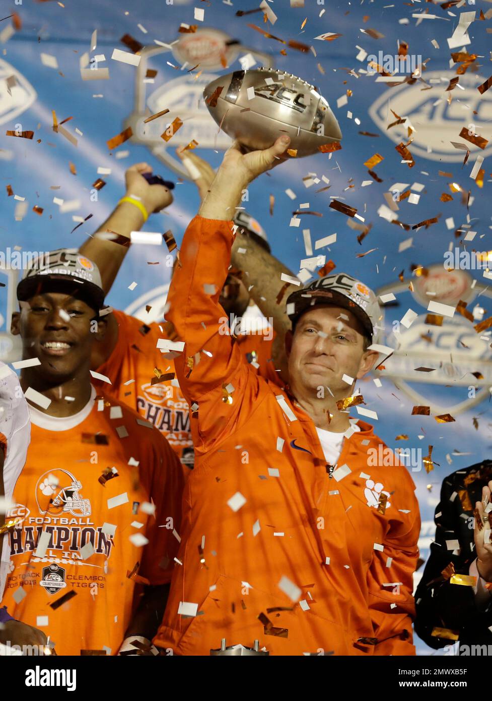 Clemson head coach Dabo Swinney raises the Atlantic Coast Conference ...