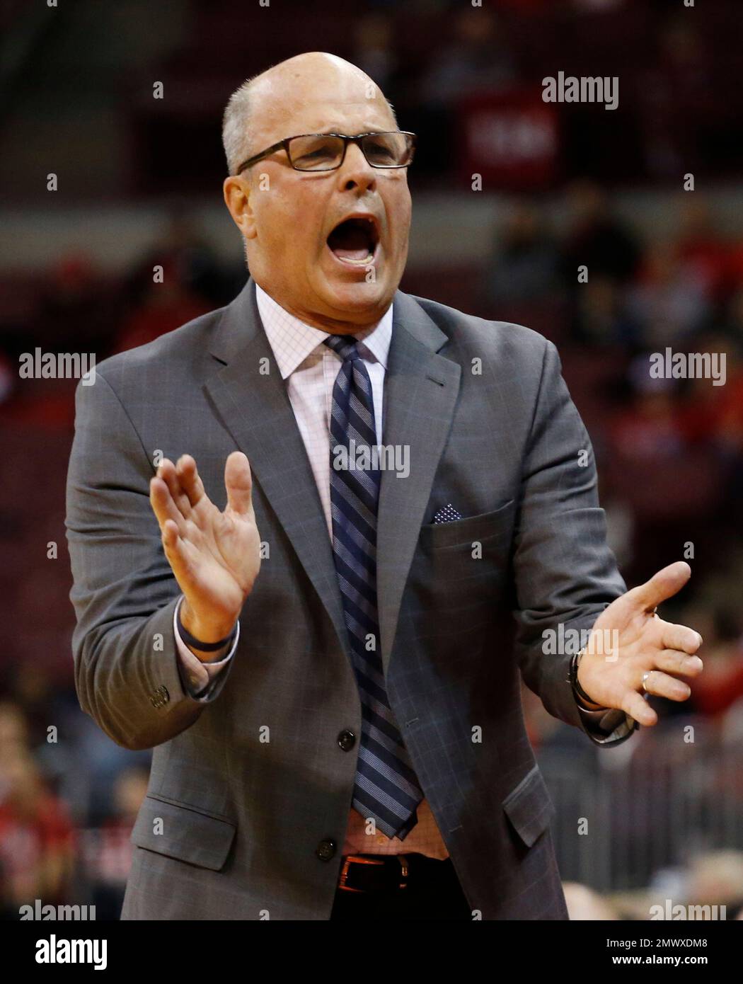 Fairleigh Dickinson head coach Greg Herenda shouts to his team during ...