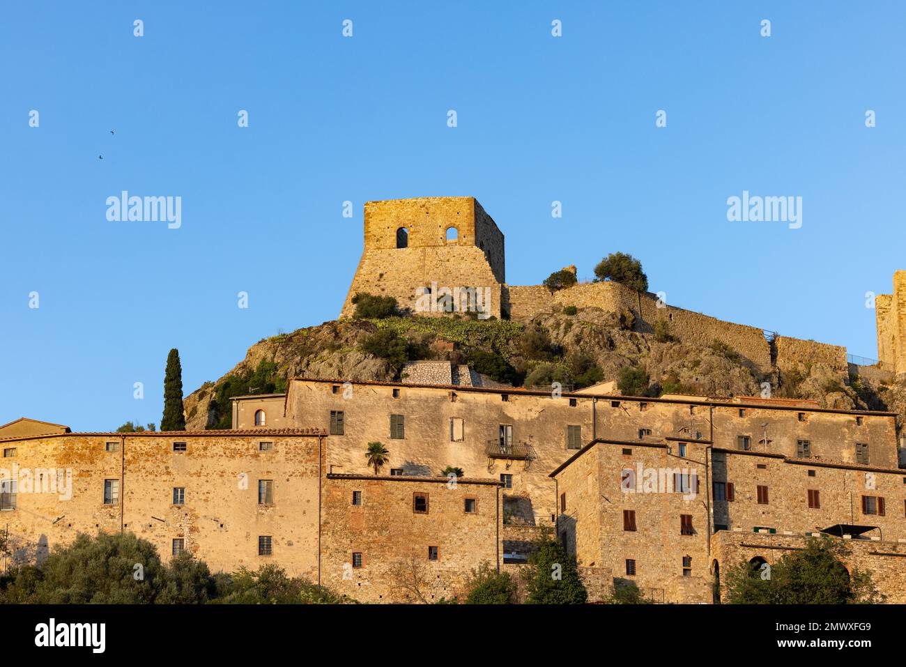 Montemassi a fortified village in the province of Grosseto. Tuscany ...