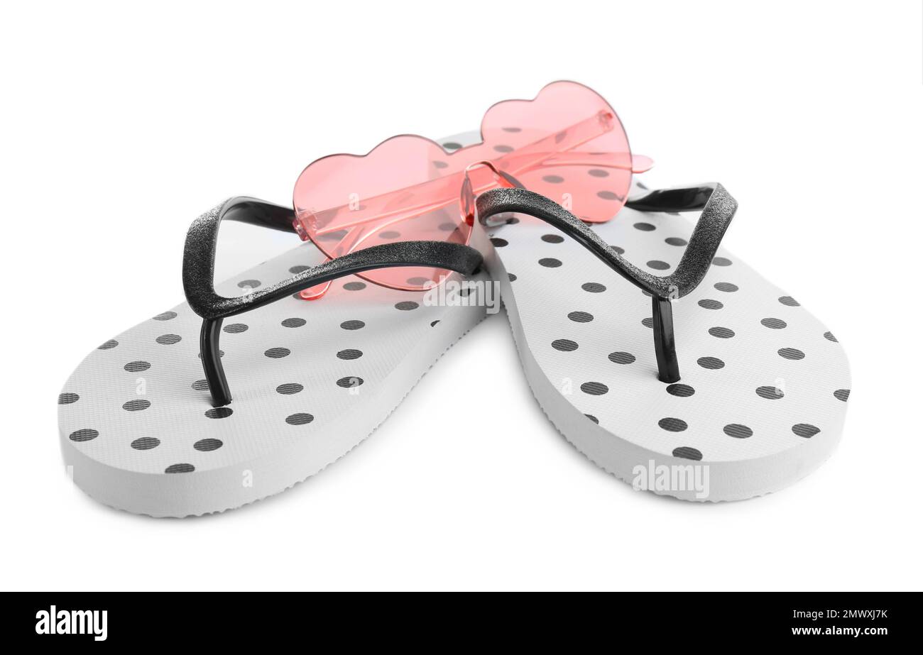 Stylish flip flops and sunglasses on white background Stock Photo - Alamy