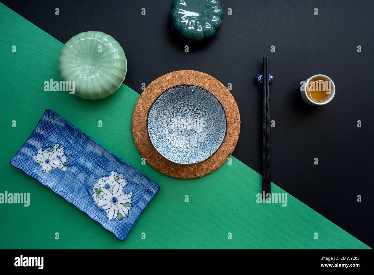 Japanese or Chinese table setting with traditional table mat and