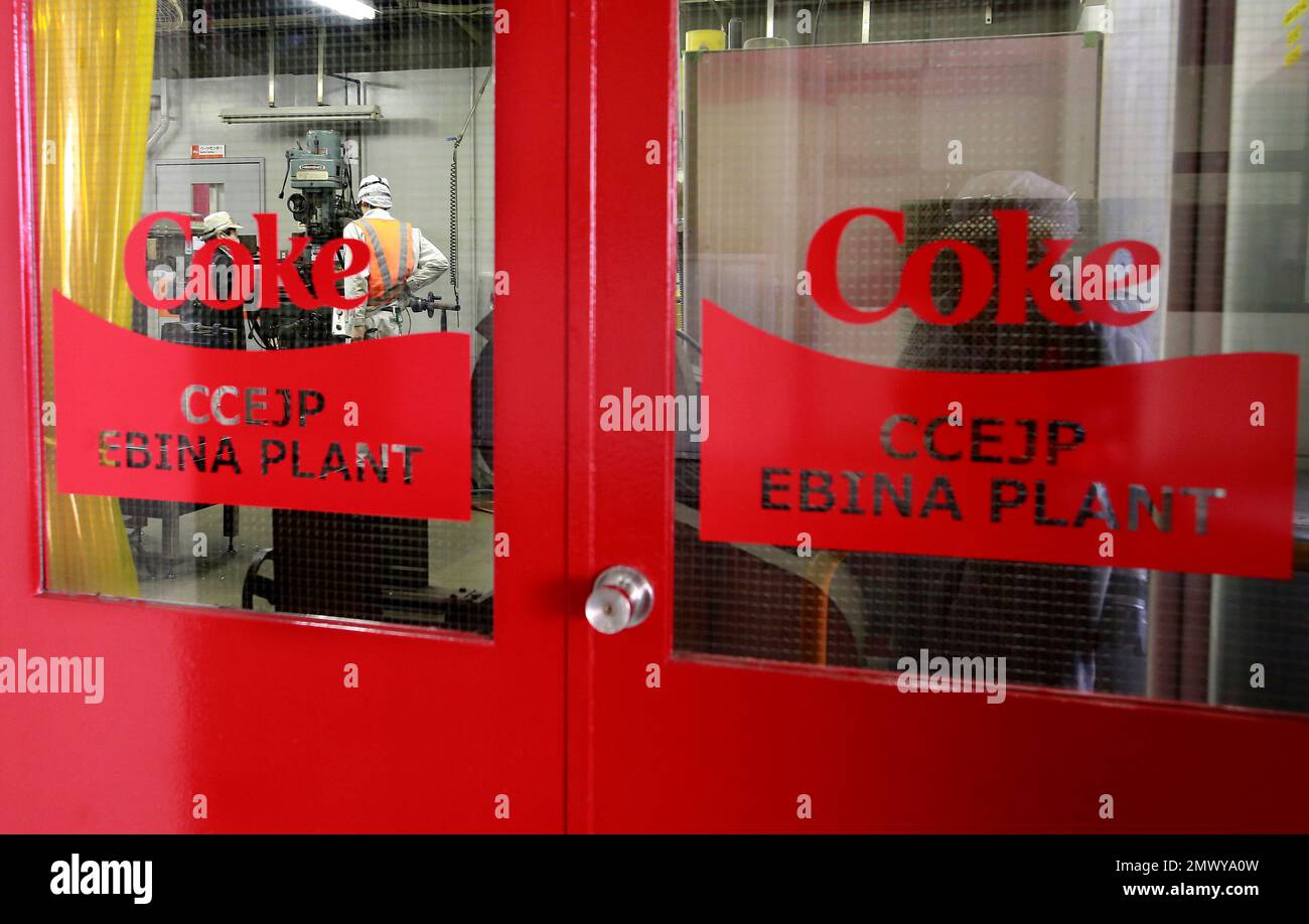 In this Nov. 17, 2016 photo, Coke logo is seen on the door of Coca-Cola ...