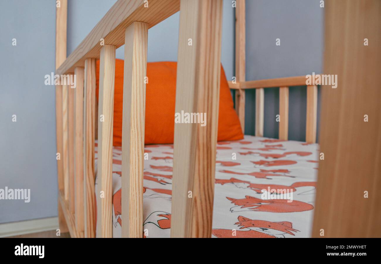 Montessori baby bed, modern children room with comfortable toddler