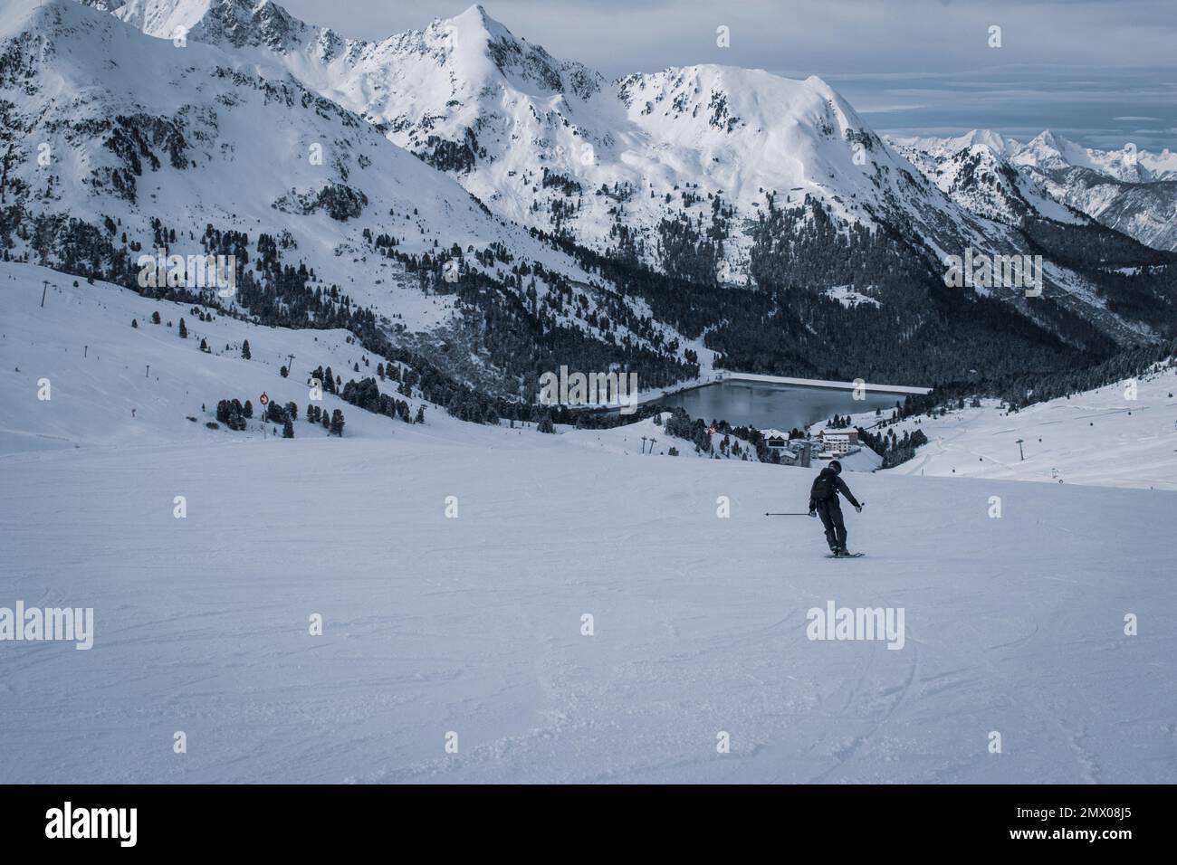 Ski in winter season, mountains and ski touring on the top of snowy mountains in Tirol, Austria. Stock Photo