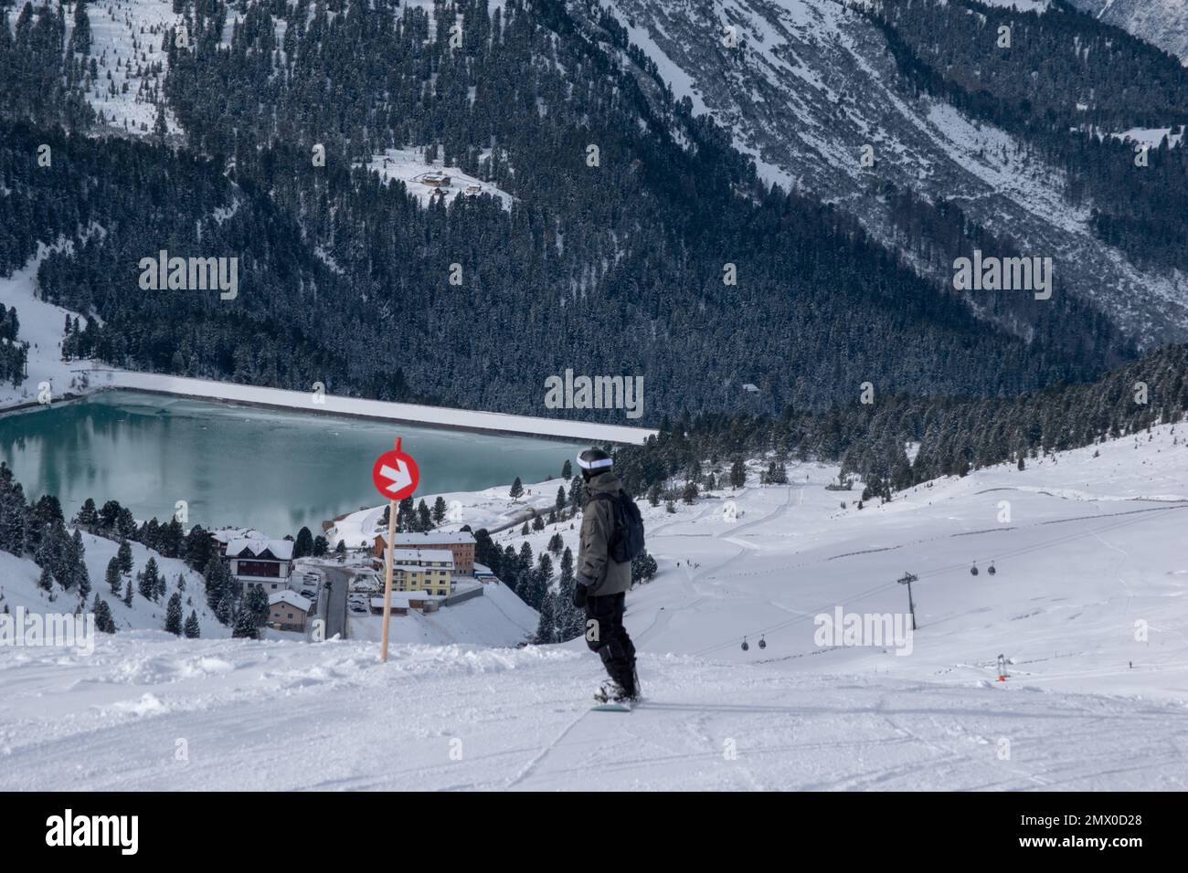 Ski in winter season, mountains and ski touring on the top of snowy mountains in Tirol, Austria. Stock Photo