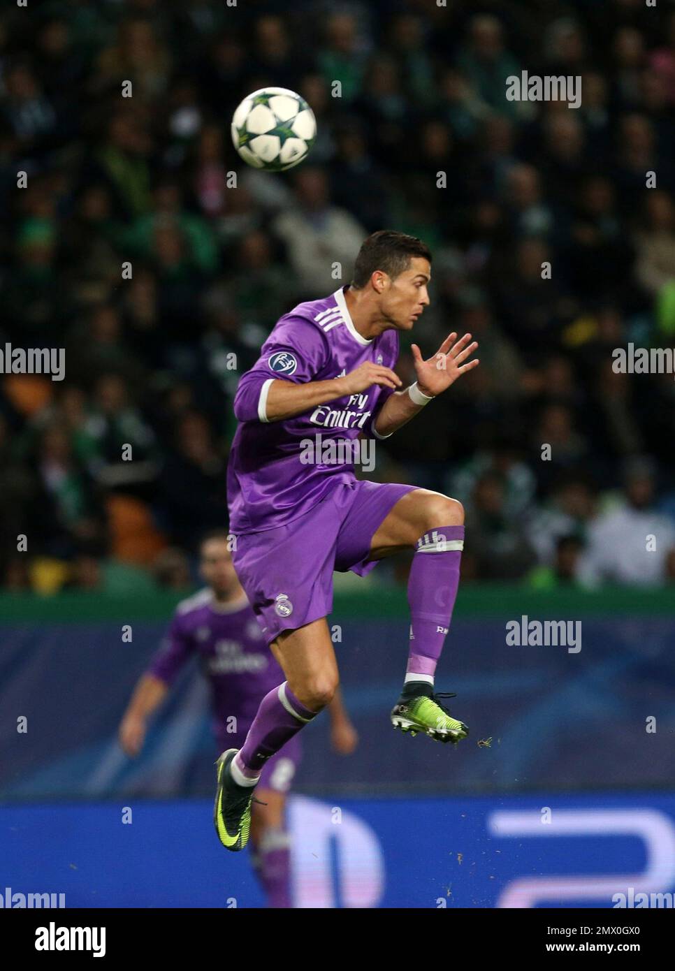 Real Madrid's Cristiano Ronaldo heads the ball during the Champions League  Group F soccer match between Sporting CP and Real Madrid at the Alvalade  stadium in Lisbon, Tuesday, Nov. 22, 2016. (AP