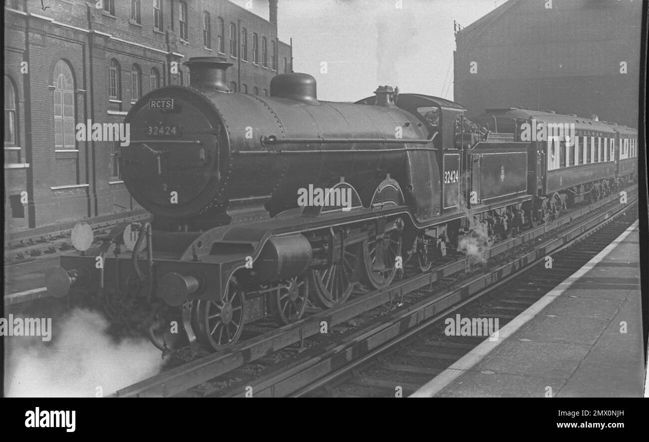 Former LBSCR Marsh Atlantic 4-4-2 as BR 32424 'Beachy Head' about to leave Brighton with the Up 'Brighton Belle' Pullman express on 5th October 1952 Stock Photo