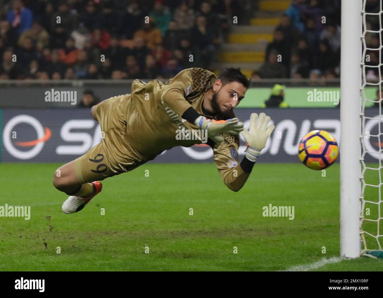 AC Milan goalkeeper Gianluigi Donnarumma saves during a Serie A soccer ...