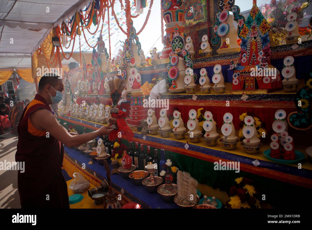 A Buddhist monk performs rituals during the purification ceremony of ...