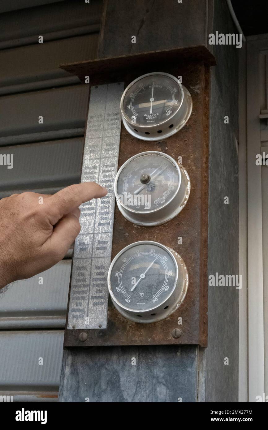 View of rusty vintage meters for temperature, humidity and pressure. Stock Photo