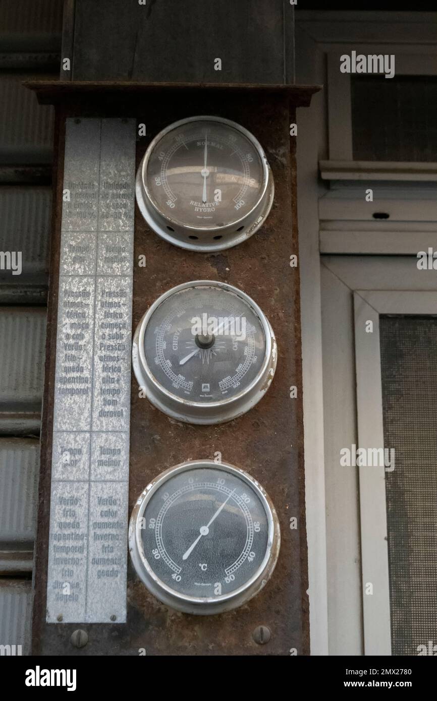 View of rusty vintage meters for temperature, humidity and pressure. Stock Photo