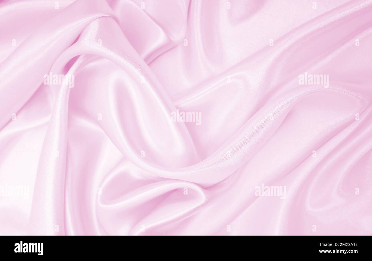 Smooth elegant pink silk or satin texture can use as wedding background ...
