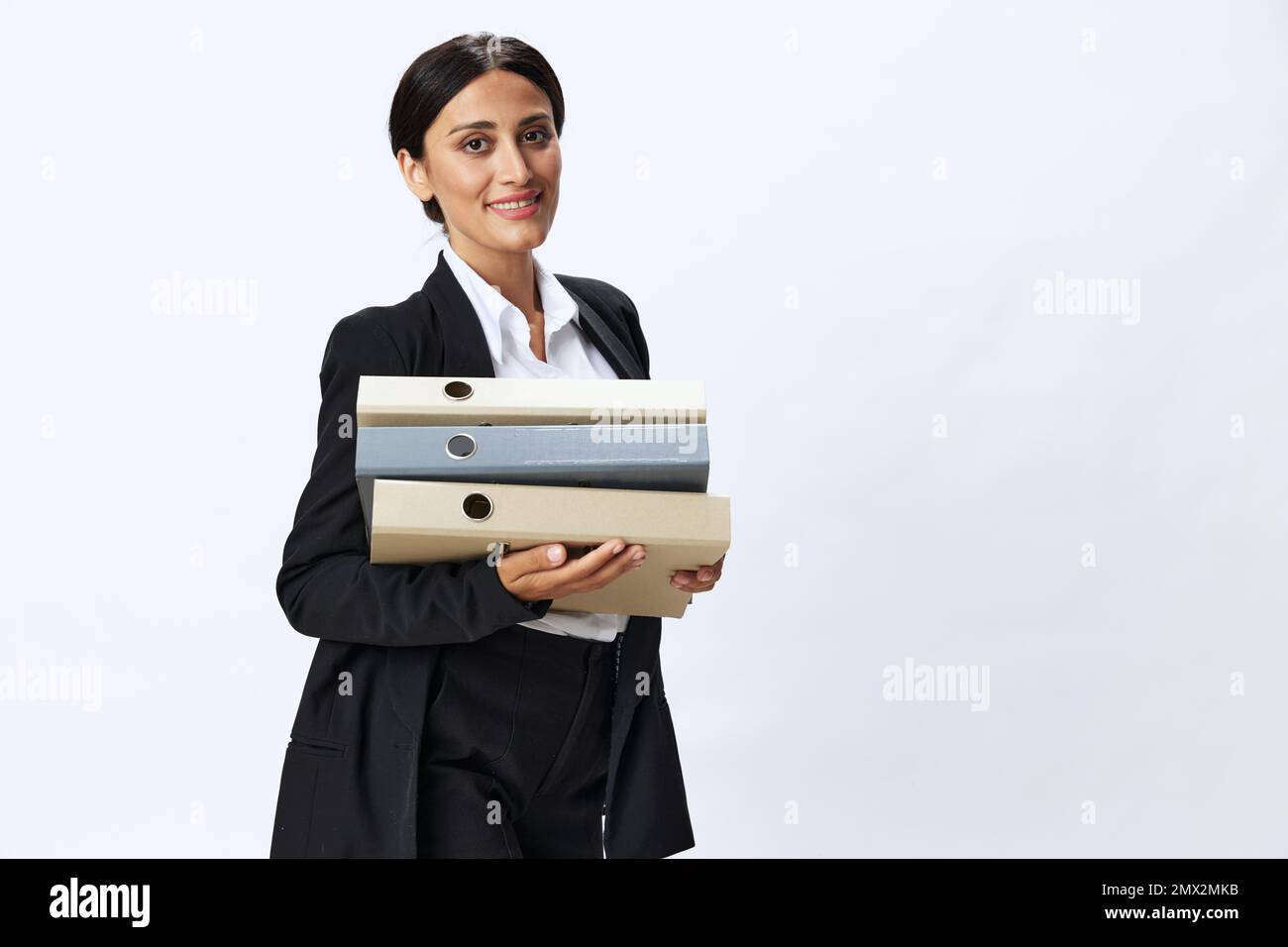Business woman with a folder of documents in her hands in a black ...