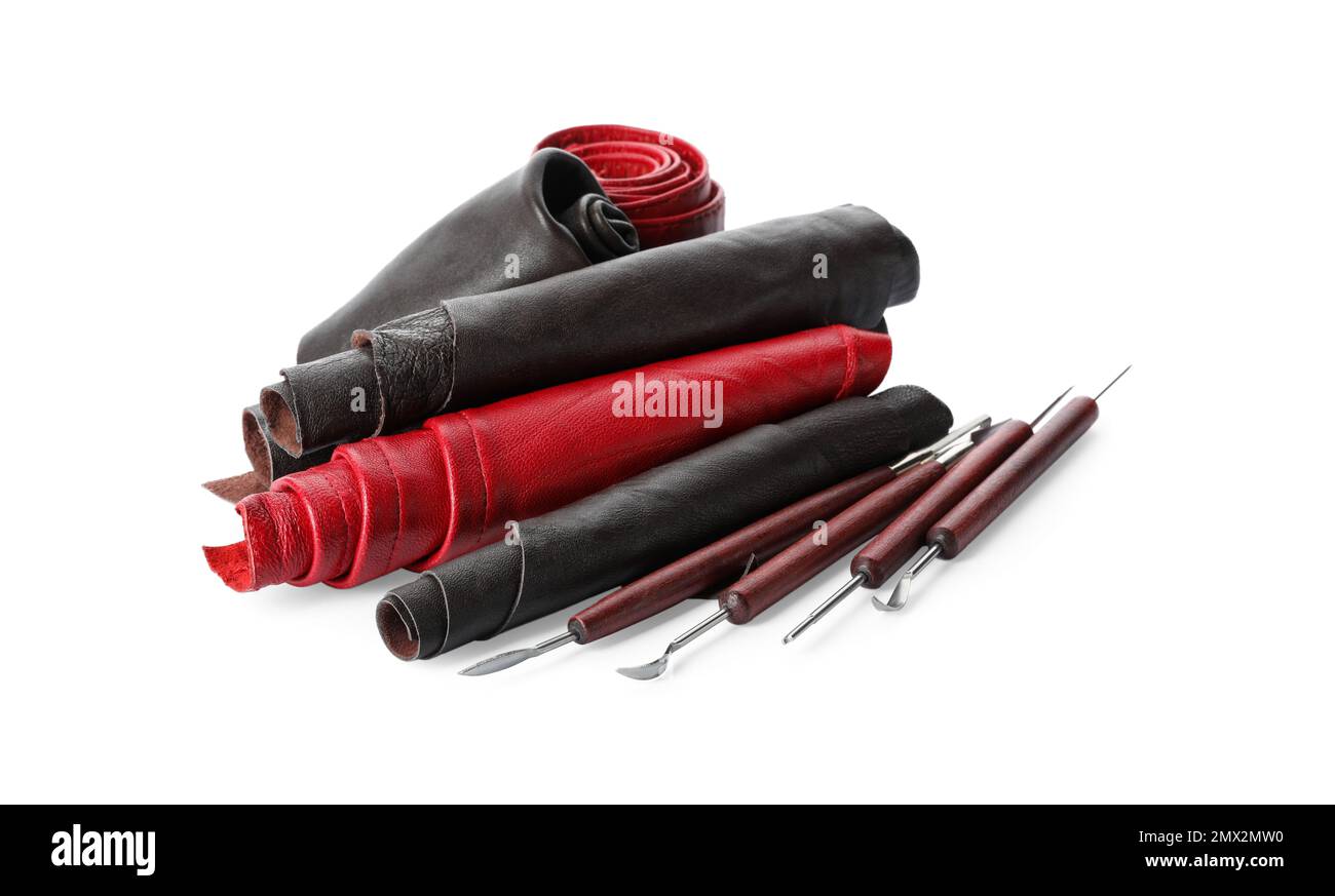 Leather samples and craftsman tools isolated on white Stock Photo