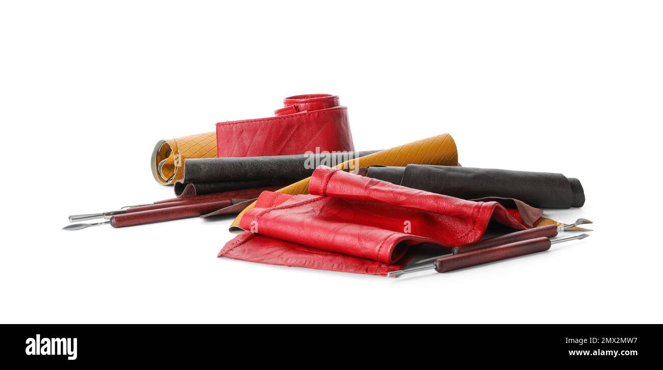 Leather samples and craftsman tools isolated on white Stock Photo