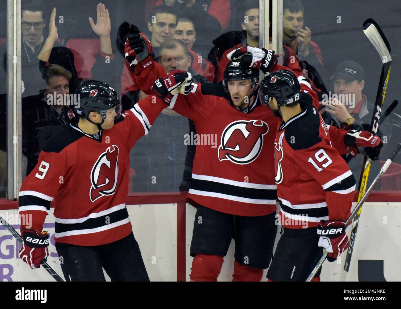 New Jersey Devils Nick Lappin center celebrates his goal with
