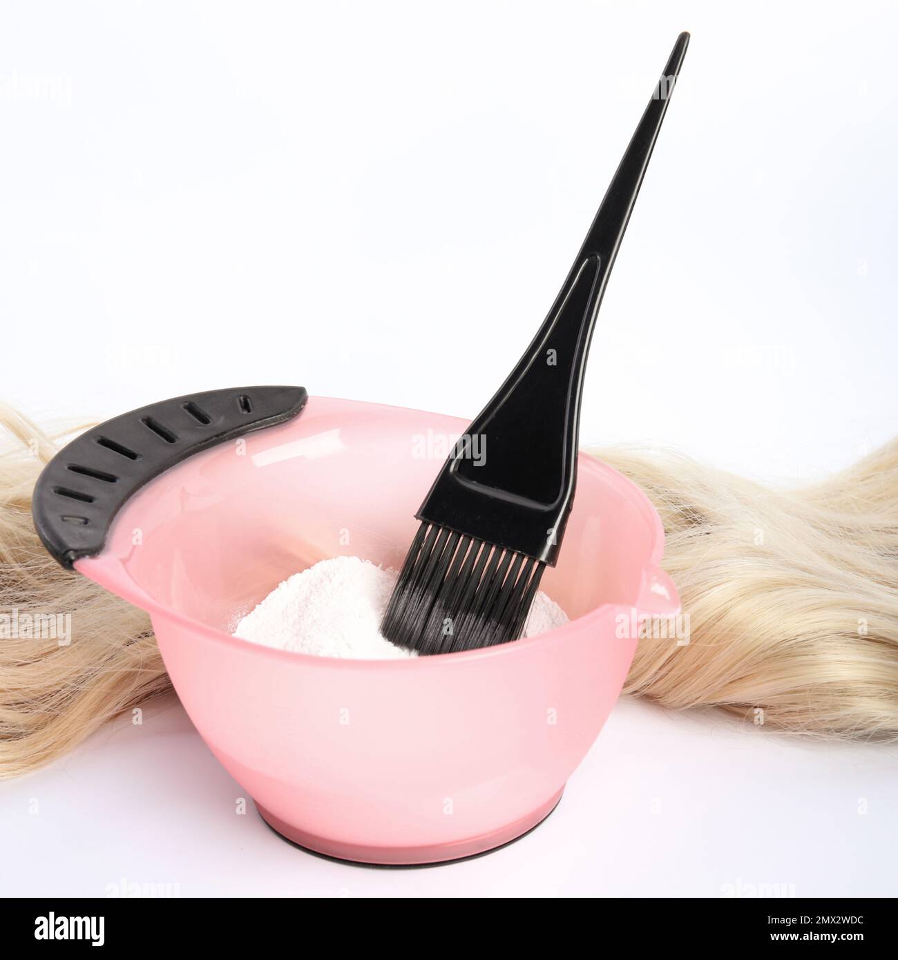 Mixing bowl and hair dye brush on electronic scale. Hair dye measuring and  mixing kit. Hair coloring tools set. Professional instrument for hair color  Stock Photo - Alamy