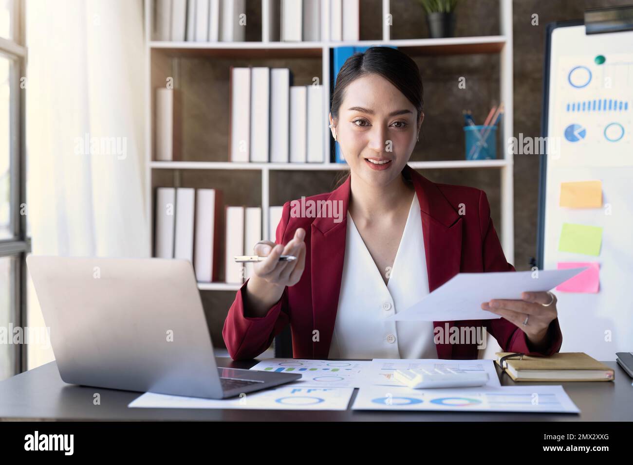 woman having documents a business in hand and signing a contract, recruitment or agreement Stock Photo