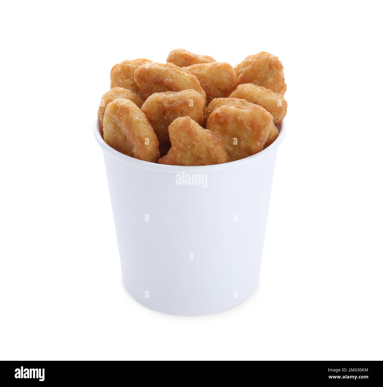 Bucket with tasty chicken nuggets isolated on white Stock Photo