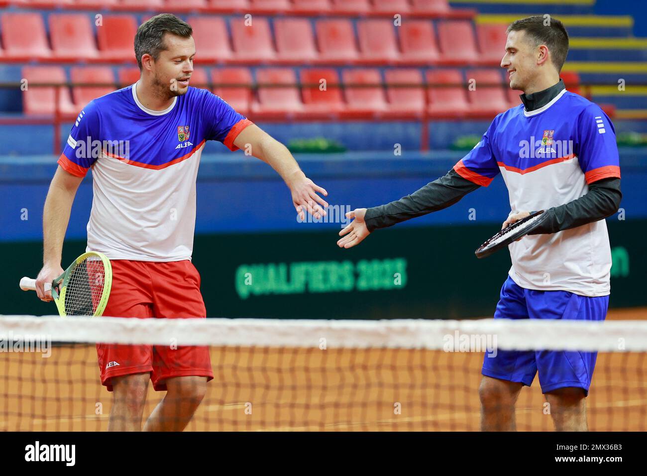 From left tennis player Adam Pavlasek and Vit Kopriva of Czech team in  action during the training session prior to the Davis Cup tennis tournament  qua Stock Photo - Alamy