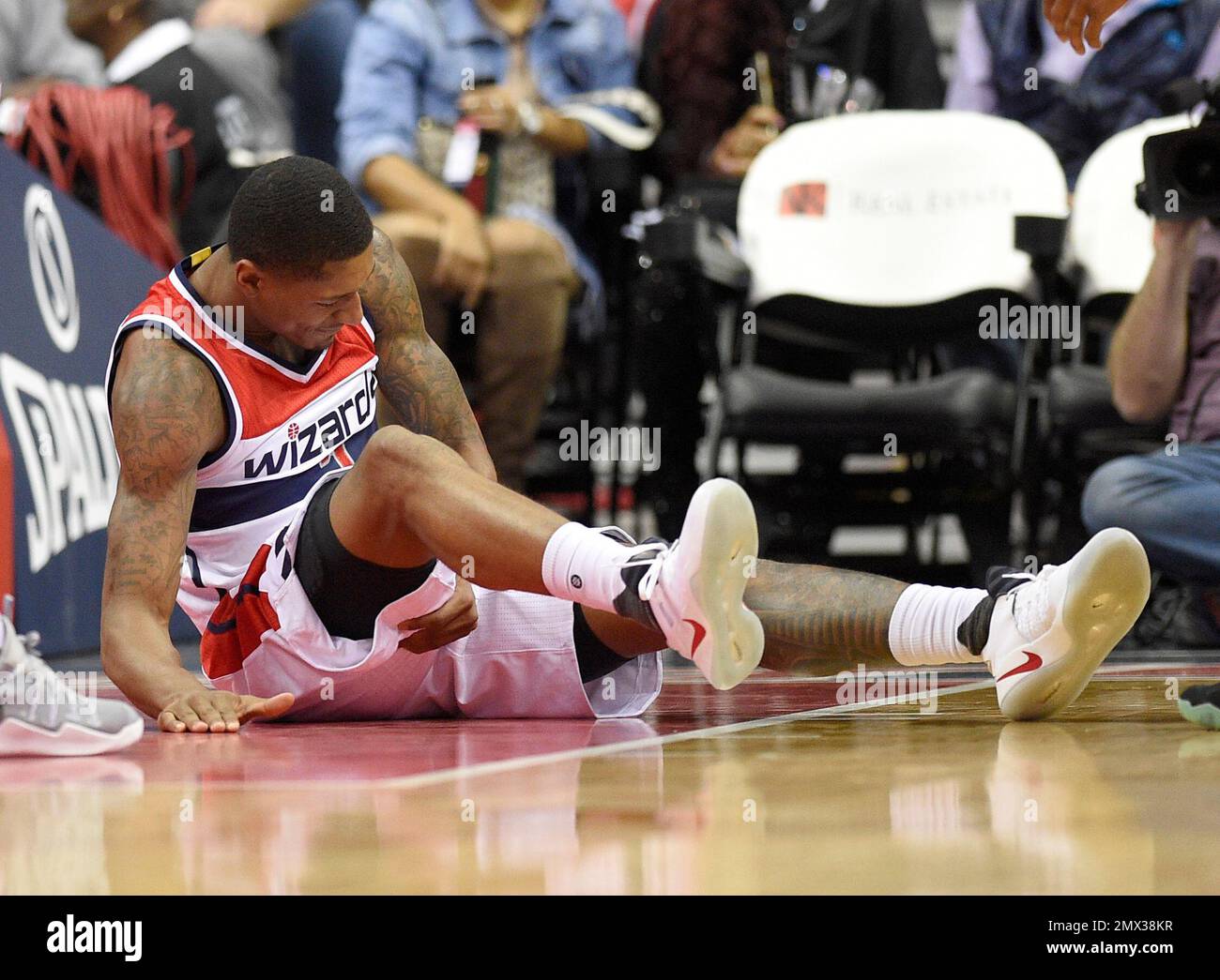 Washington Wizards guard Bradley Beal grabs his leg after he was injured  during the second half of the team's NBA basketball game against the Boston  Celtics, Wednesday, Nov. 9, 2016, in Washington.