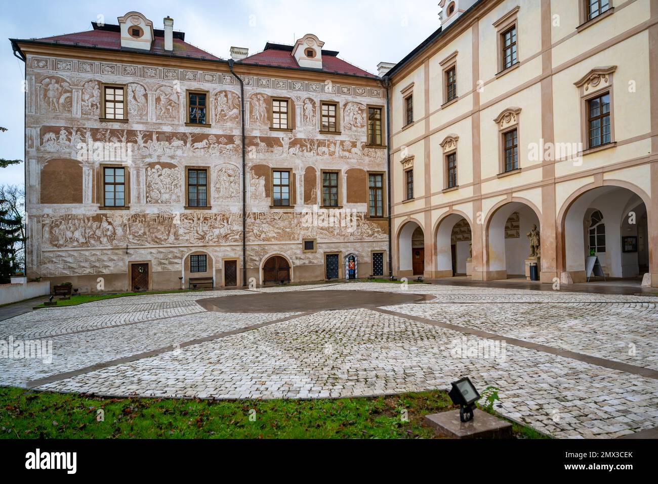 Castle Benatky nad Jizerou, painted sgraffito on building, courtyard. Czech republic. Stock Photo