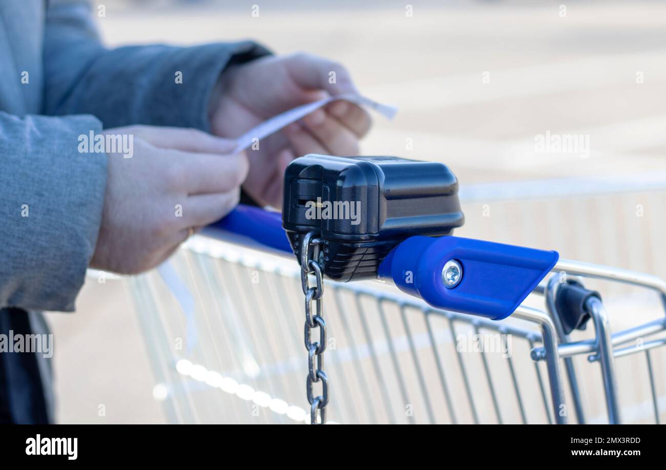 many trolley shopping cart with coin lock anti theft system Stock Photo Alamy