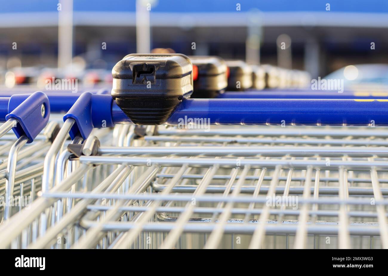 many trolley shopping cart with coin lock anti theft system Stock Photo Alamy