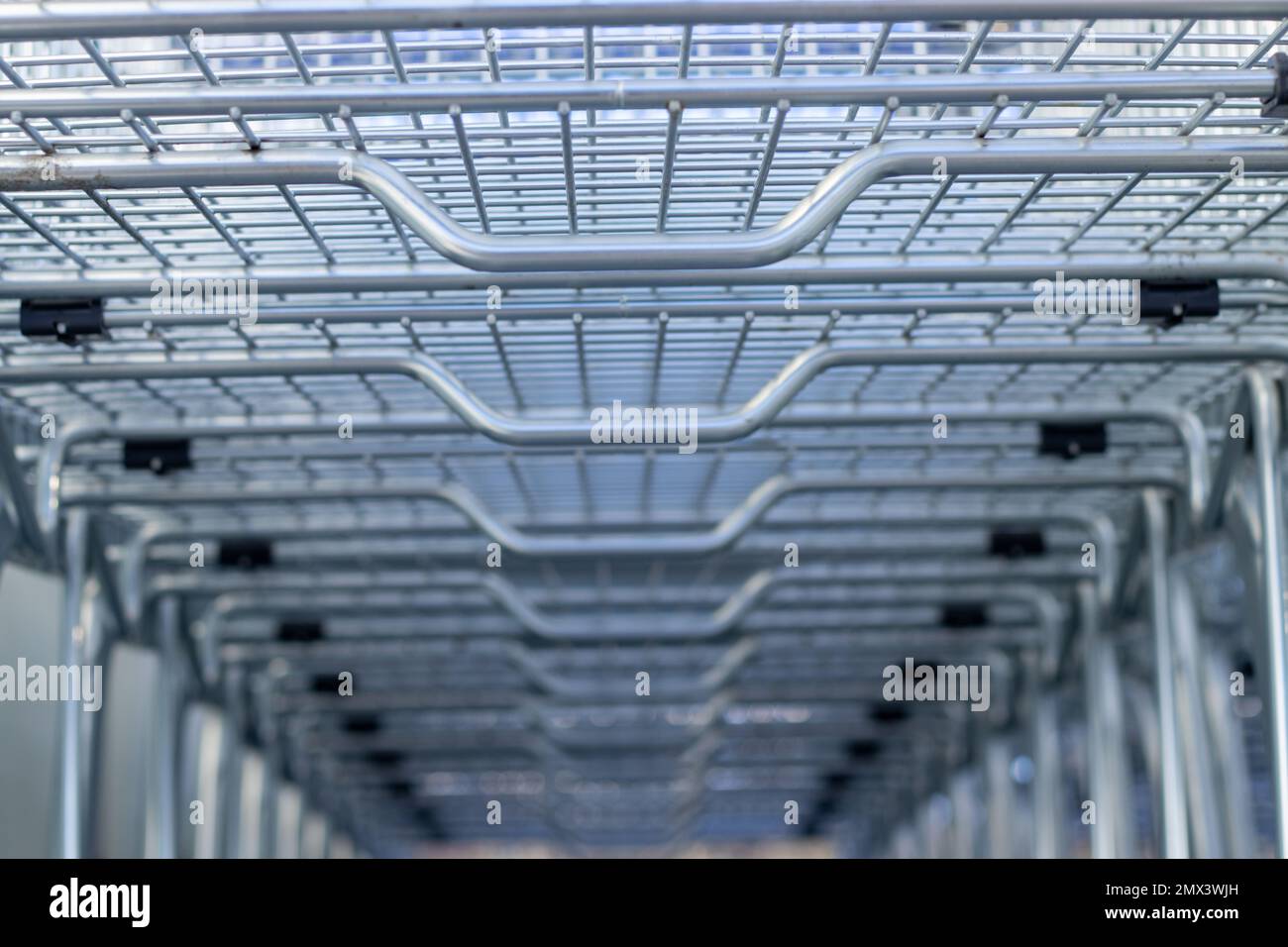 many trolley shopping cart with coin lock anti theft system Stock Photo
