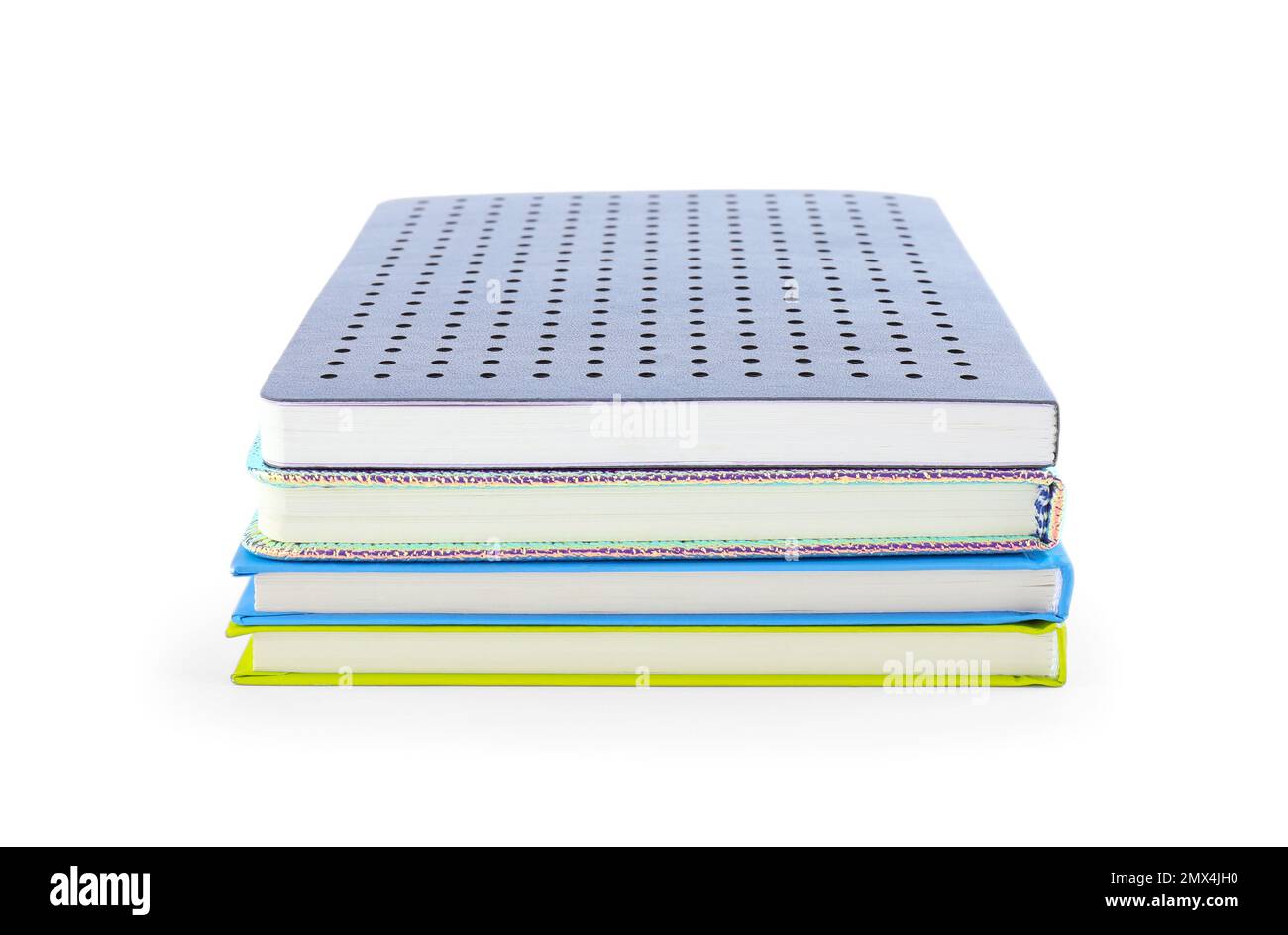Stack of different notepads isolated on white Stock Photo