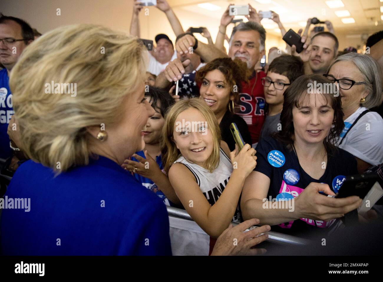 Democratic presidential candidate Hillary Clinton greets members of the
