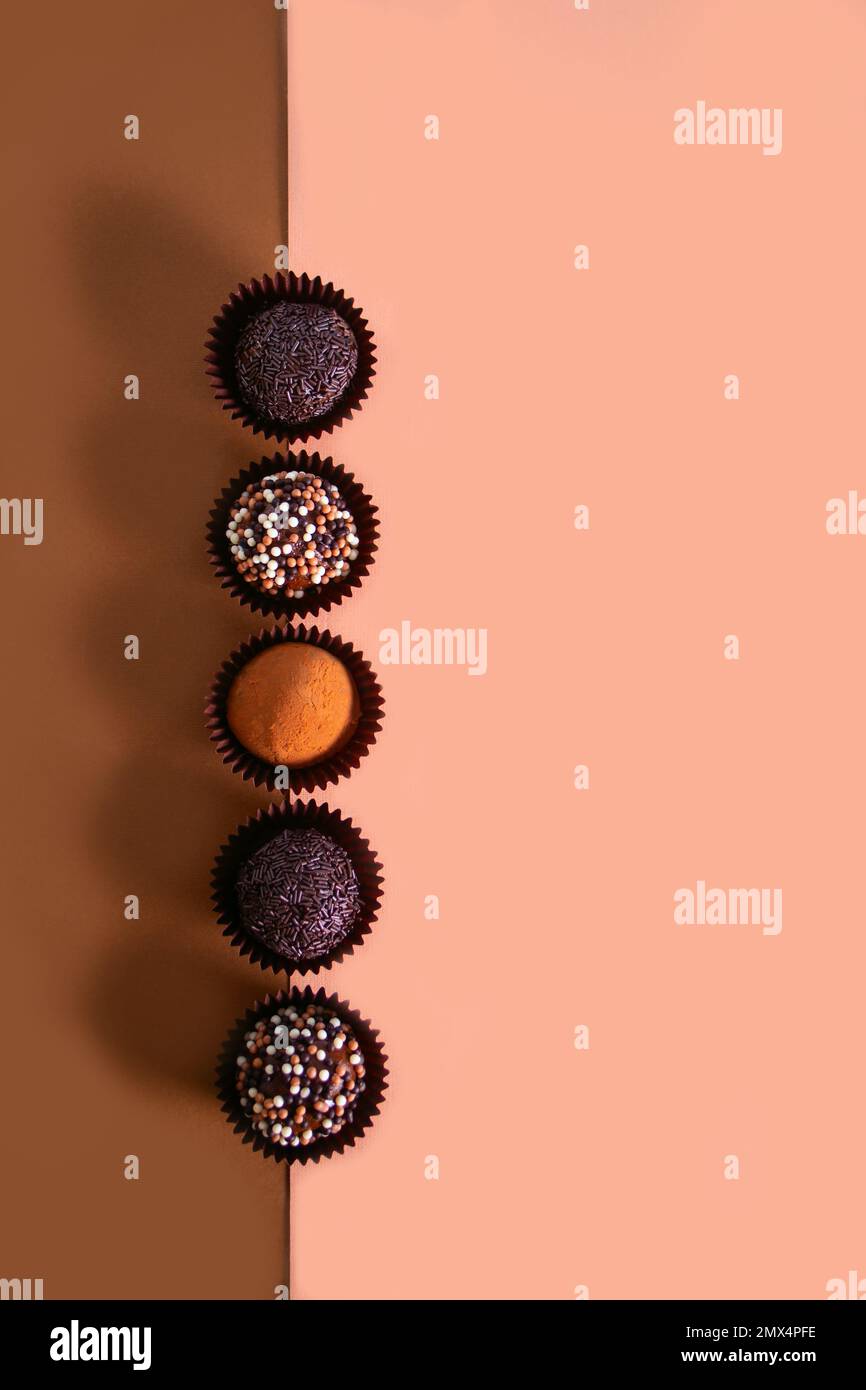 Row of traditional brazilian sweet chocolate ball Brigadeiro made with