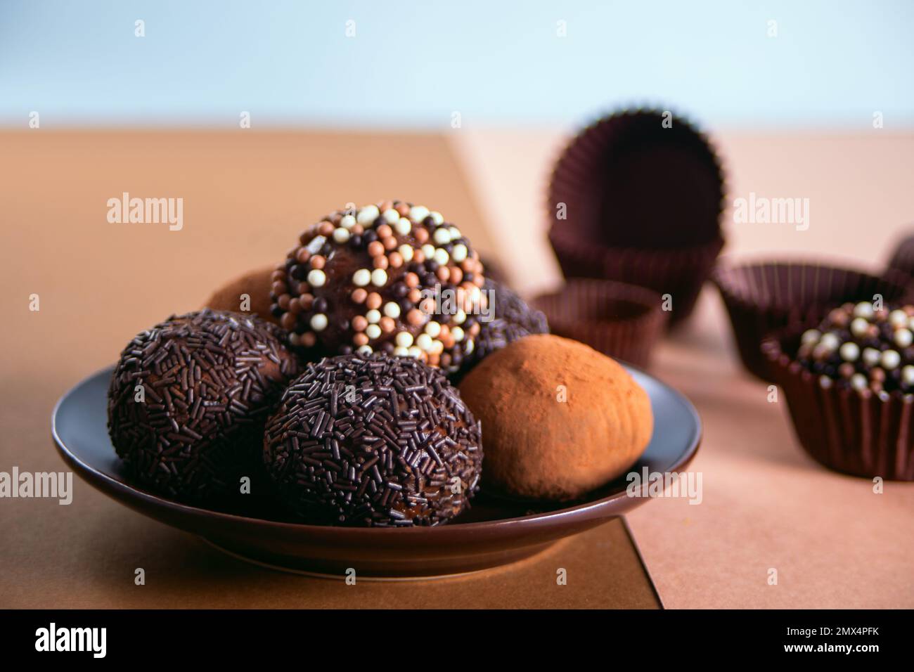 Traditional brazilian sweet chocolate ball Brigadeiro made with cocoa