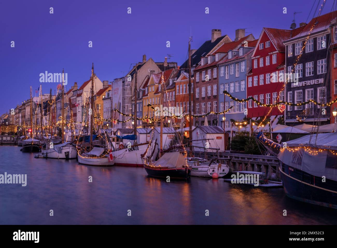 Nyhavn Canal at sunrise, Christmas time, Copenhagen, Denmark Stock Photo