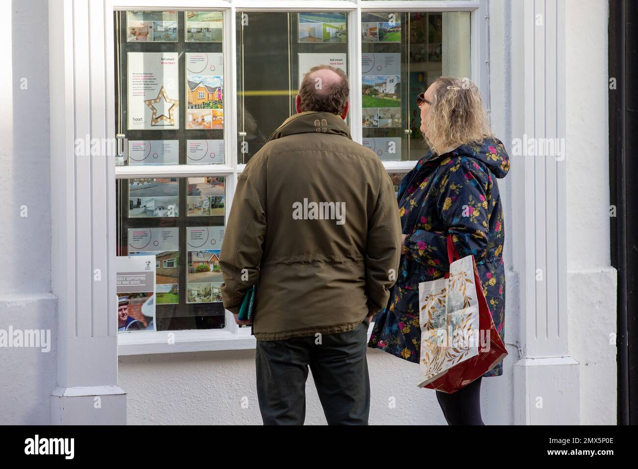 Picture dated February 2nd shows people looking in estate agents windows in Ely,Cambs,on Thursday morning as it is announced there will be another inc Stock Photo