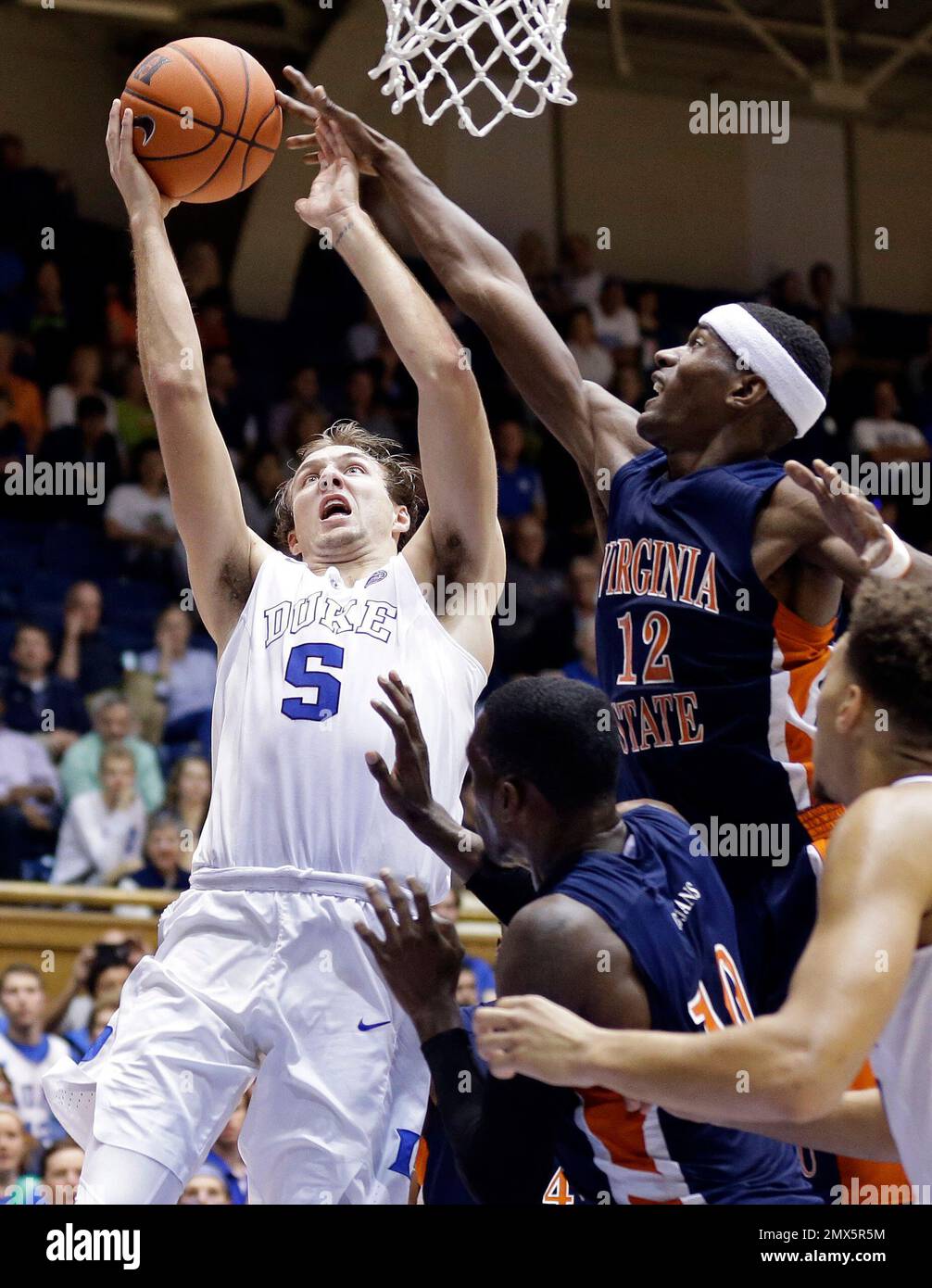 Duke's Luke Kennard (5) drives to the basket as Virginia State's Walter