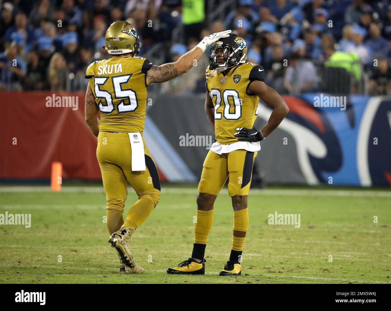 Jacksonville Jaguars linebacker Dan Skuta 55 pats cornerback Jalen Ramsey 20 on the helmet in the first half of an NFL football game against the Tennessee Titans Thursday Oct. 27 2016 in