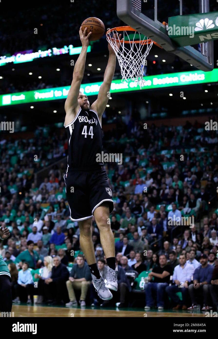 Brooklyn Nets guard Bojan Bogdanovic (44) slams a dunk during the first quarter of an NBA