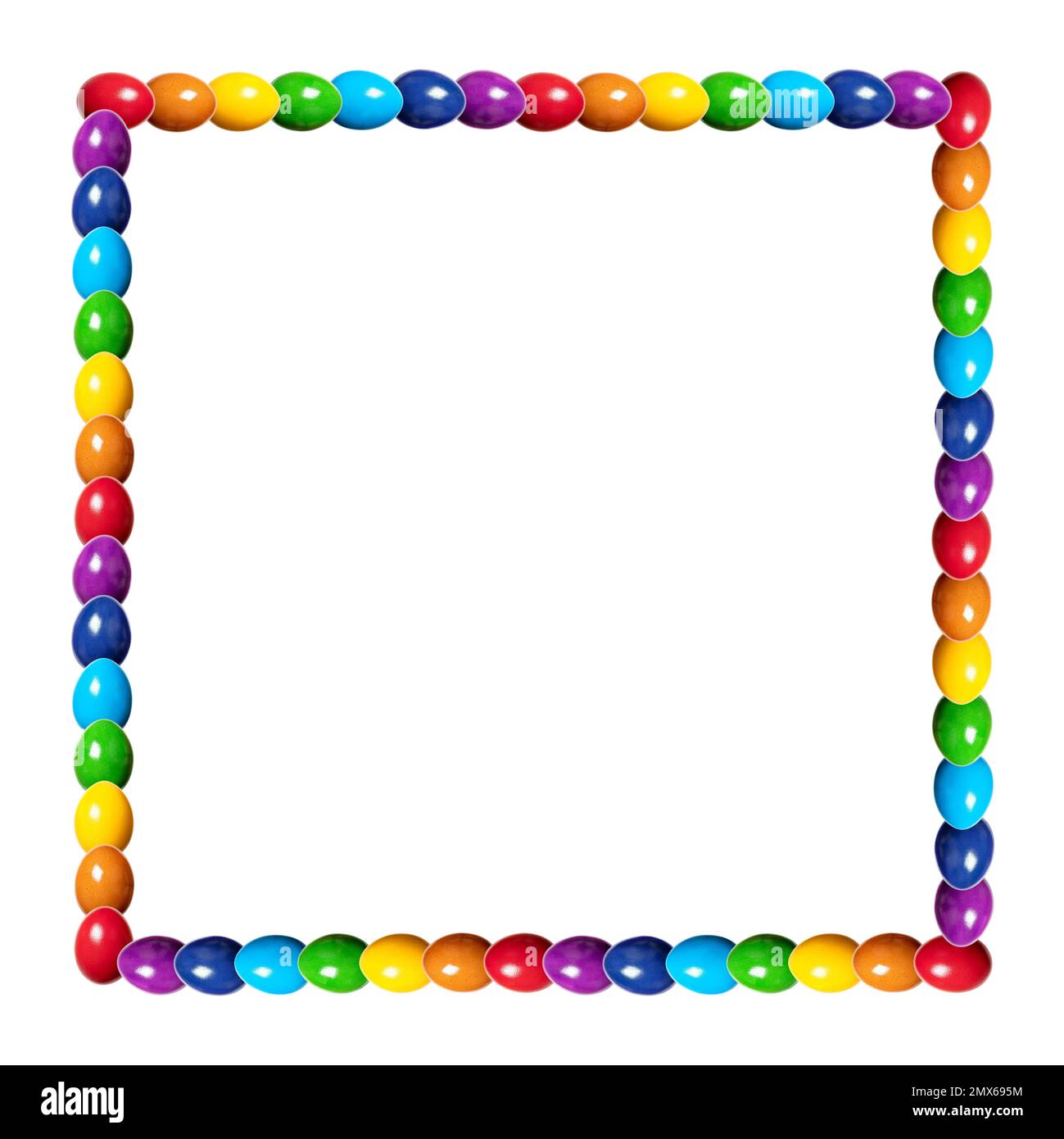 Square border made of rainbow colored eggs. Squared frame, made of multi colored, dyed chicken eggs. Traditionally used during Easter time as a gift. Stock Photo