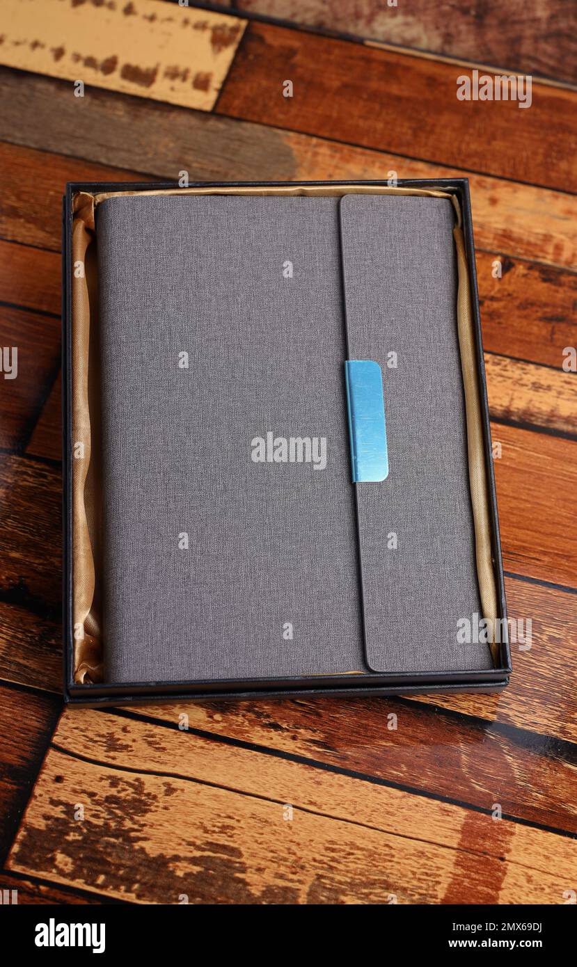 gray color fabric and leather customized diary mockup photography Stock ...