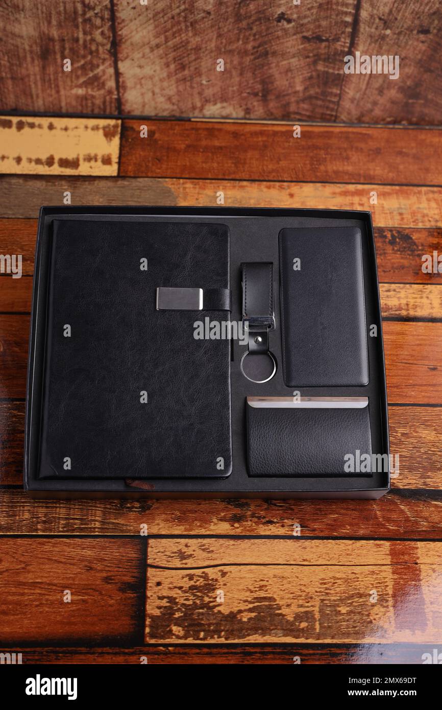 Customized corporate gift box mock up image, Personalized power bank with mobile stylus, hard cover Customized notebook and id card holder,  Customize Stock Photo