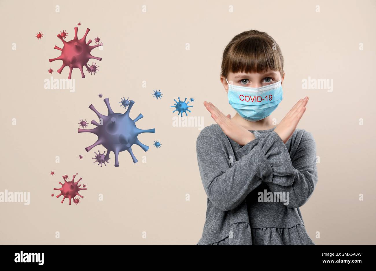 Little girl wearing medical mask on beige background. Virus protection ...
